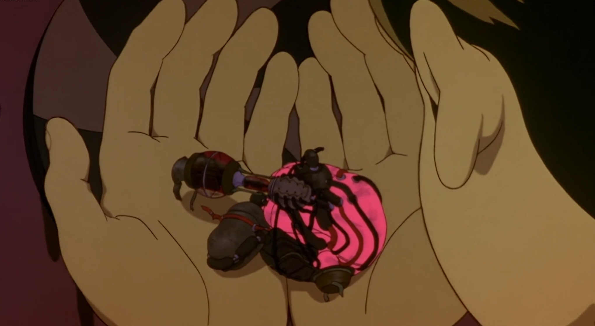 Kenichi holding Tima's heart